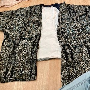 Navy blue shawl with an open back from Maurice’s